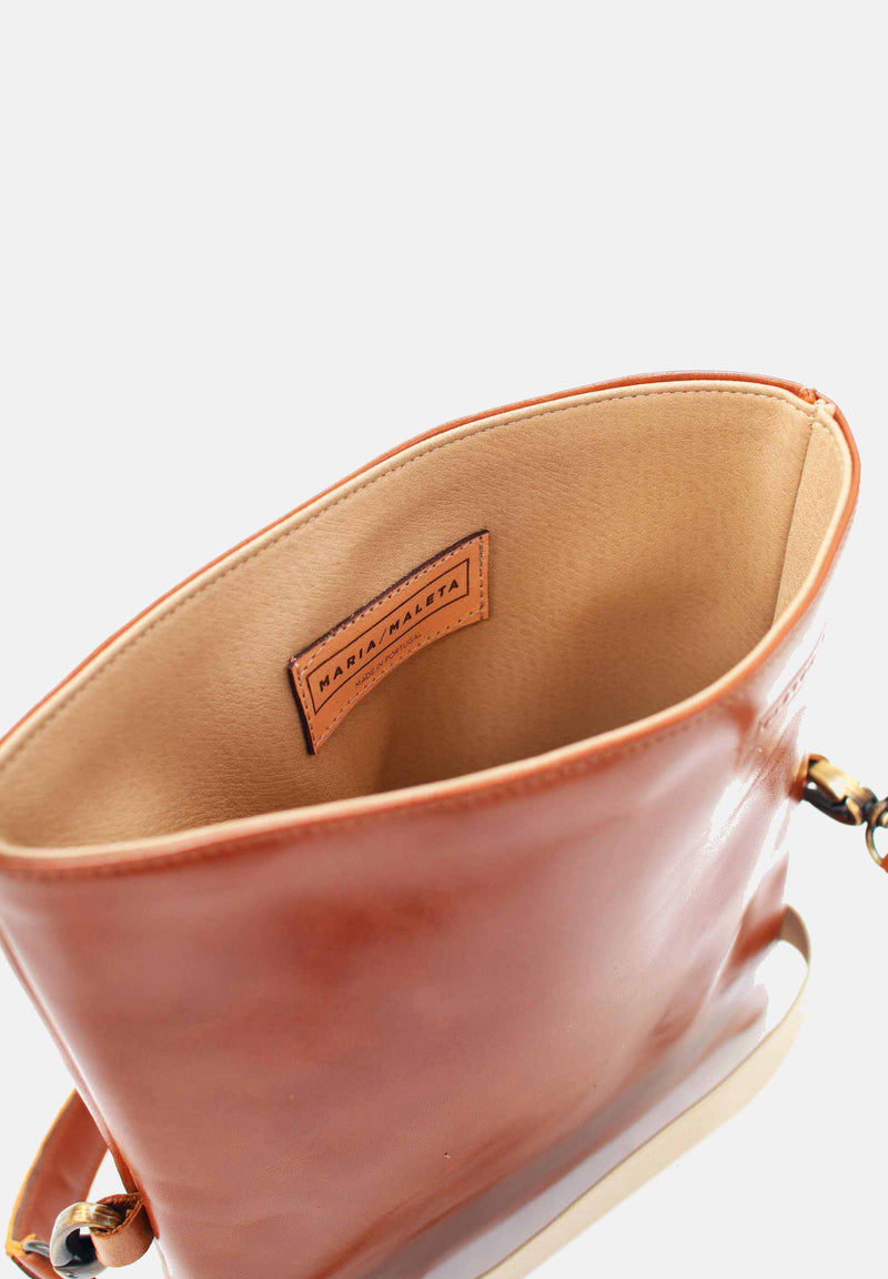 slim and small belt bag in brown leather