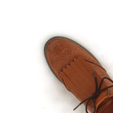 Fringe Shoe Accessory in brown shoes in brown leather